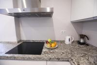 Kuchyň nebo kuchyňský kout v ubytování Apartamento Rialto