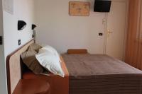 Posteľ alebo postele v izbe v ubytovaní Hotel Verdemare
