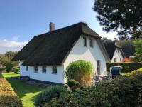 Zahrada ubytování Ferienhaus Strandgut - Reetdachhaus in Strandnähe