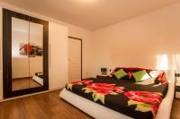 Posteľ alebo postele v izbe v ubytovaní Holiday House Alex
