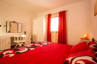 Posteľ alebo postele v izbe v ubytovaní Holiday House Alex
