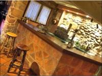 The lounge or bar area at La Casona del Pastor