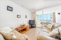TV a/nebo společenská místnost v ubytování Apartamento playa de los pinos