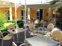 Reštaurácia alebo iné gastronomické zariadenie v ubytovaní Hotel Alibi