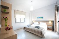 Posteľ alebo postele v izbe v ubytovaní Anemon Villas