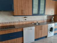 Kuchyň nebo kuchyňský kout v ubytování Apartamento Alfarrobeira Mar