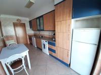 Kuchyň nebo kuchyňský kout v ubytování Apartamento Alfarrobeira Mar