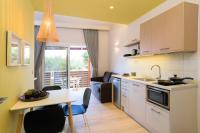 Kuchyň nebo kuchyňský kout v ubytování Iliana Apartments