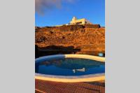 Bazén v ubytovaní Playa Marina Eco Bungalow – Arrieta View alebo v jeho blízkosti