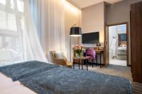 Łóżko lub łóżka w pokoju w obiekcie Hotel M29