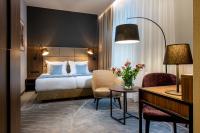 Łóżko lub łóżka w pokoju w obiekcie Hotel M29
