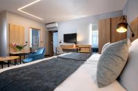 Łóżko lub łóżka w pokoju w obiekcie Hotel M29