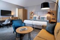 Łóżko lub łóżka w pokoju w obiekcie Hotel M29