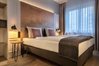 Postel nebo postele na pokoji v ubytování Garner Hotel Berlin - Wilmersdorf by IHG