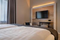 Postel nebo postele na pokoji v ubytování Garner Hotel Berlin - Wilmersdorf by IHG