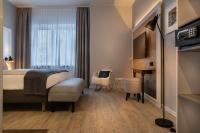TV a/nebo společenská místnost v ubytování Garner Hotel Berlin - Wilmersdorf by IHG