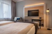 Postel nebo postele na pokoji v ubytování Garner Hotel Berlin - Wilmersdorf by IHG