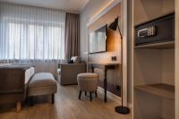 TV a/nebo společenská místnost v ubytování Garner Hotel Berlin - Wilmersdorf by IHG