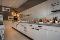 Kuchyň nebo kuchyňský kout v ubytování Garner Hotel Berlin - Wilmersdorf by IHG