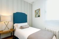 Postel nebo postele na pokoji v ubytování Genteel Home Mateos Gago
