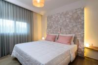 Postel nebo postele na pokoji v ubytování Iliana Apartments