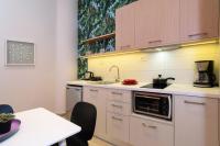 Kuchyň nebo kuchyňský kout v ubytování Iliana Apartments