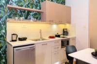 Kuchyň nebo kuchyňský kout v ubytování Iliana Apartments