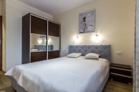 Łóżko lub łóżka w pokoju w obiekcie Apartamenty Granitica Zakopane