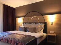 Łóżko lub łóżka w pokoju w obiekcie Villa Aruba & Private SPA Suites