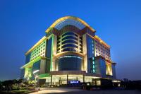 a large building with a curved roof at Radisson Blu Kaushambi Delhi NCR in Ghaziabad