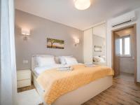 Łóżko lub łóżka w pokoju w obiekcie Holiday Home Villa Coriticum otium by Interhome