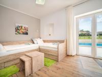 Łóżko lub łóżka w pokoju w obiekcie Holiday Home Villa Coriticum otium by Interhome