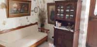 A bed or beds in a room at Madalo