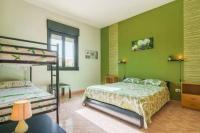 Posteľ alebo postele v izbe v ubytovaní Villa Vacanze Giuseppe