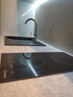 Kuchyň nebo kuchyňský kout v ubytování Bielańska Apartment