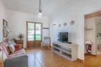 TV a/nebo společenská místnost v ubytování CAsA SA MARINA