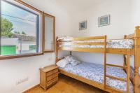 Postel nebo postele na pokoji v ubytování CAsA SA MARINA