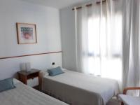 Postel nebo postele na pokoji v ubytování Villa Suculenta