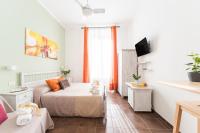TV a/nebo společenská místnost v ubytování Domus Victoria Guest House