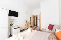 TV a/nebo společenská místnost v ubytování Domus Victoria Guest House