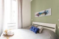 Postel nebo postele na pokoji v ubytování Domus Victoria Guest House