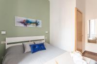 Postel nebo postele na pokoji v ubytování Domus Victoria Guest House