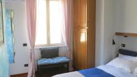 Posteľ alebo postele v izbe v ubytovaní San Domenico Apartment (in the heart of historic centre)