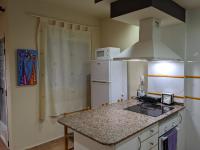 Kuchyň nebo kuchyňský kout v ubytování Apartamento zona residencial Montesol