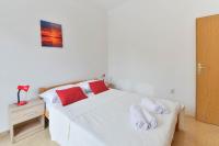 Postel nebo postele na pokoji v ubytování Apartments Lavanda