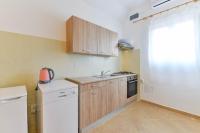 Kuchyň nebo kuchyňský kout v ubytování Apartments Lavanda