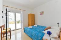 Postel nebo postele na pokoji v ubytování Apartments Lavanda