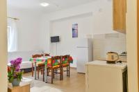 Kuchyň nebo kuchyňský kout v ubytování Apartments Lavanda