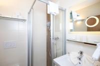 Kúpeľňa v ubytovaní Angerer Alpine Suiten und Familienappartements Tirol