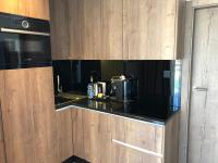 Kuchyňa alebo kuchynka v ubytovaní Szczyrk-Art Apartments